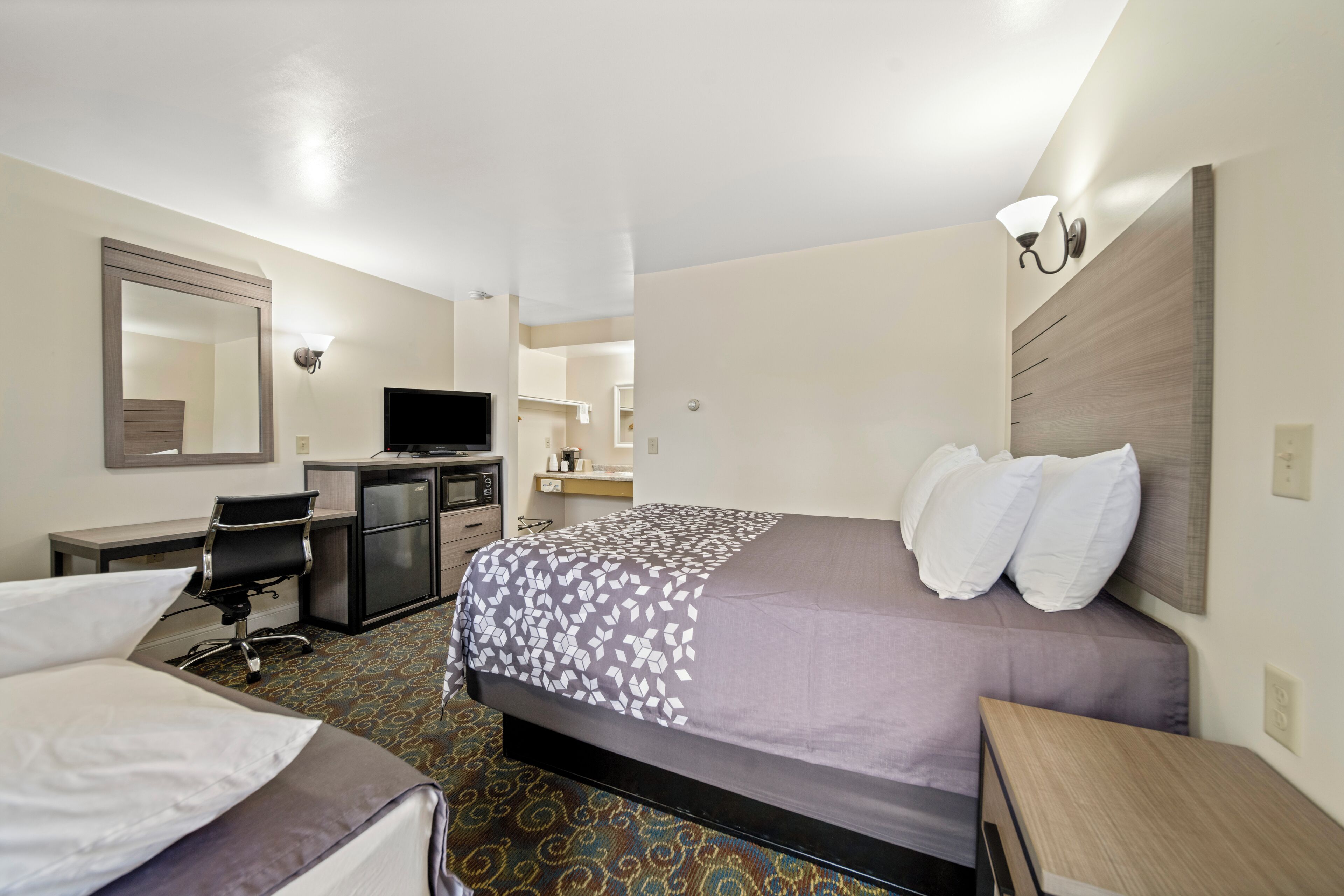 room, multiple beds | premium bedding, desk, iron/ironing board, rollaway beds