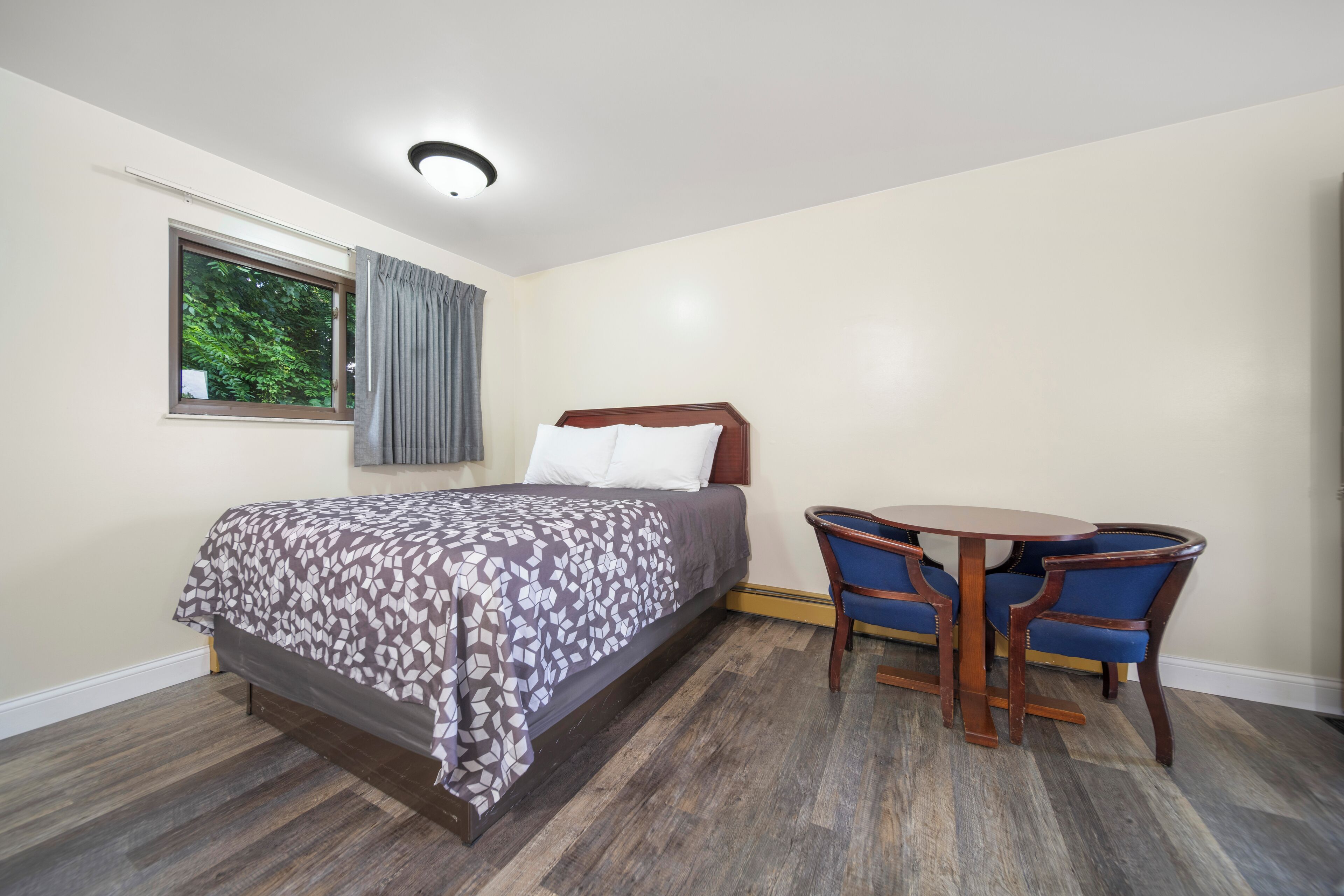 family suite, multiple beds | premium bedding, desk, iron/ironing board, rollaway beds
