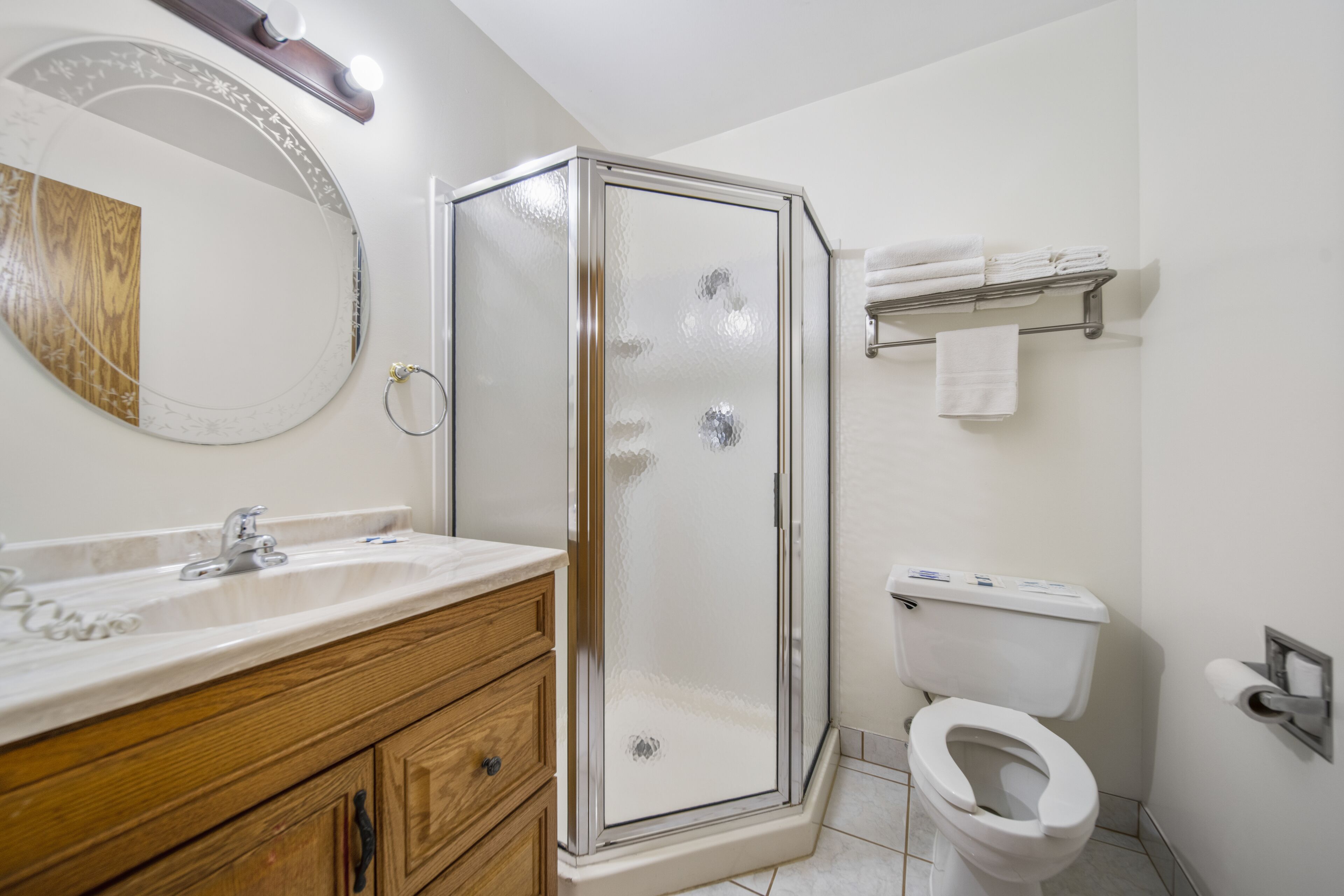 suite, multiple beds, jetted tub | bathroom | combined shower/bathtub, free toiletries, hair dryer, towels