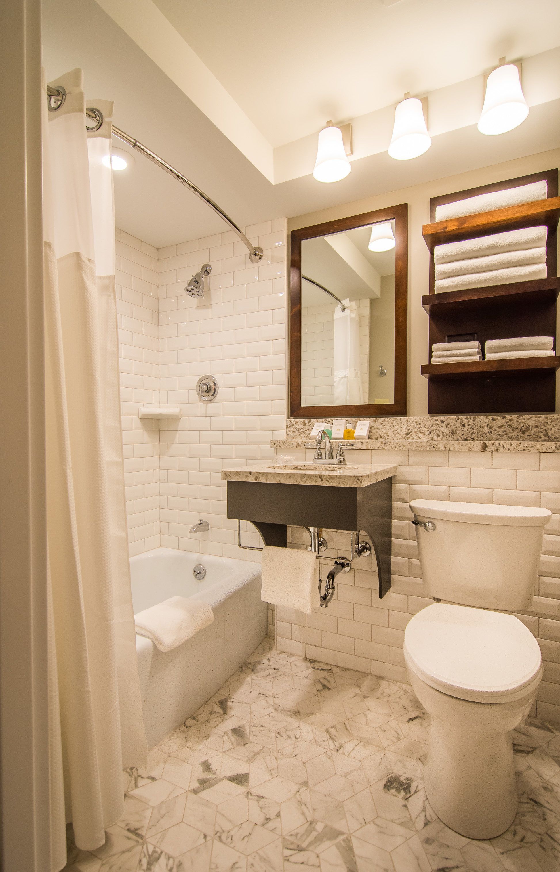 combined shower/bathtub, free toiletries, hair dryer, towels