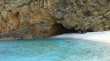 Una spiaggia nelle vicinanze, teli da spiaggia