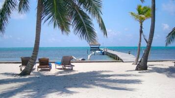 On the beach, sun loungers, beach towels