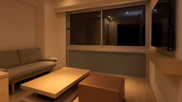 Premier Twin Room | Living area | Flat-screen TV