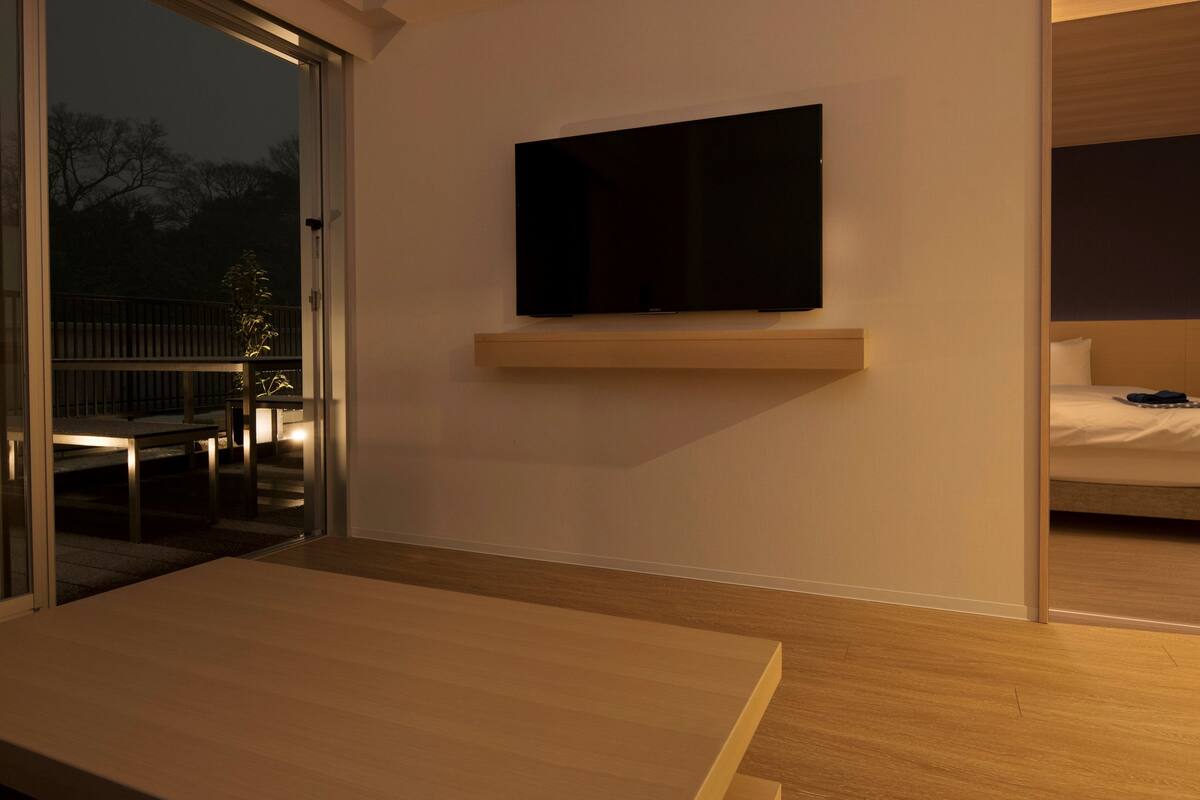 premier twin room, terrace | living area | flat-screen tv