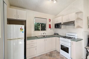 Standard 2 Bedroom Cabin - Pet Friendly | Private kitchen | Fridge, microwave, oven, stovetop