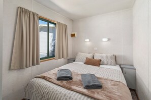 Economy 2 Bedroom Cabin - Pet Friendly | Iron/ironing board, bed sheets - Mittagong Holiday Park (Mittagong)