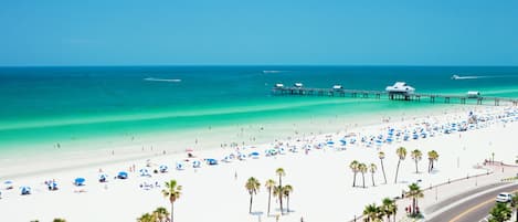 On the beach, sun loungers, beach towels