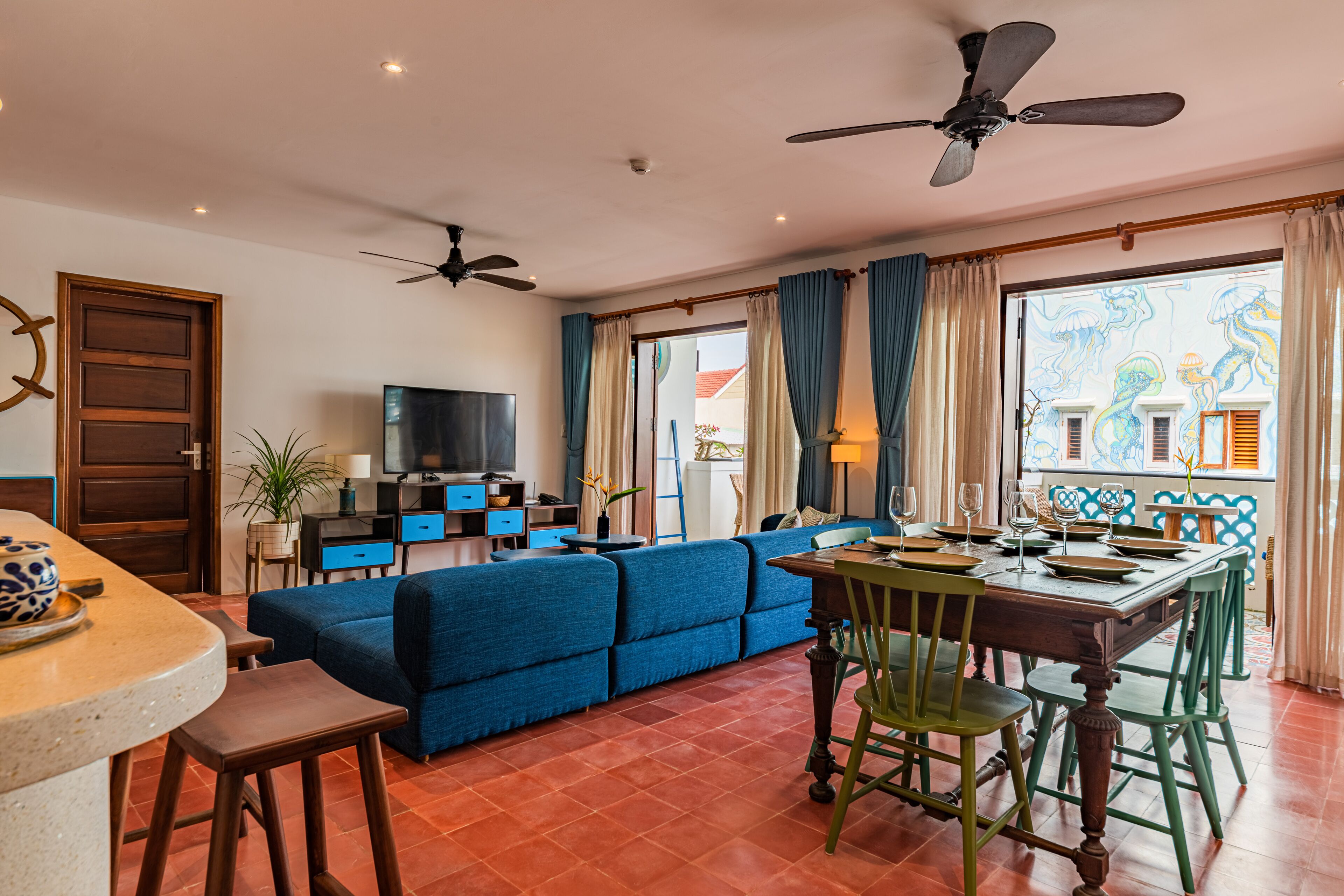 deluxe apartment, 3 bedrooms, ocean view | living area | flat-screen tv