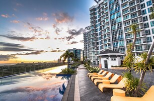 Outdoor pool, open 6:00 AM to 10:00 PM, pool umbrellas, pool loungers