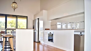 House, 4 Bedrooms | Private kitchen | Coffee/tea maker, full-sized fridge, microwave, oven - Cumberland House (Airlie Beach)