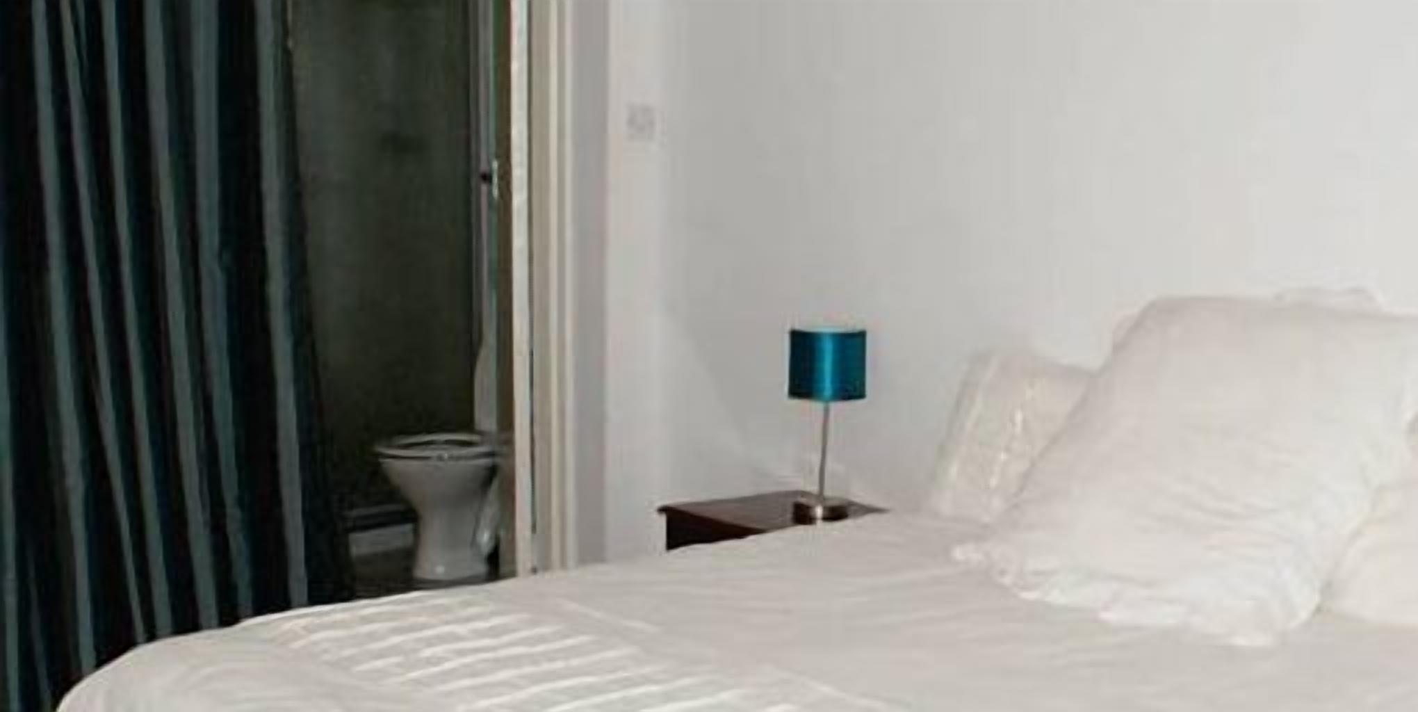 Premium bedding, desk, blackout curtains, soundproofing