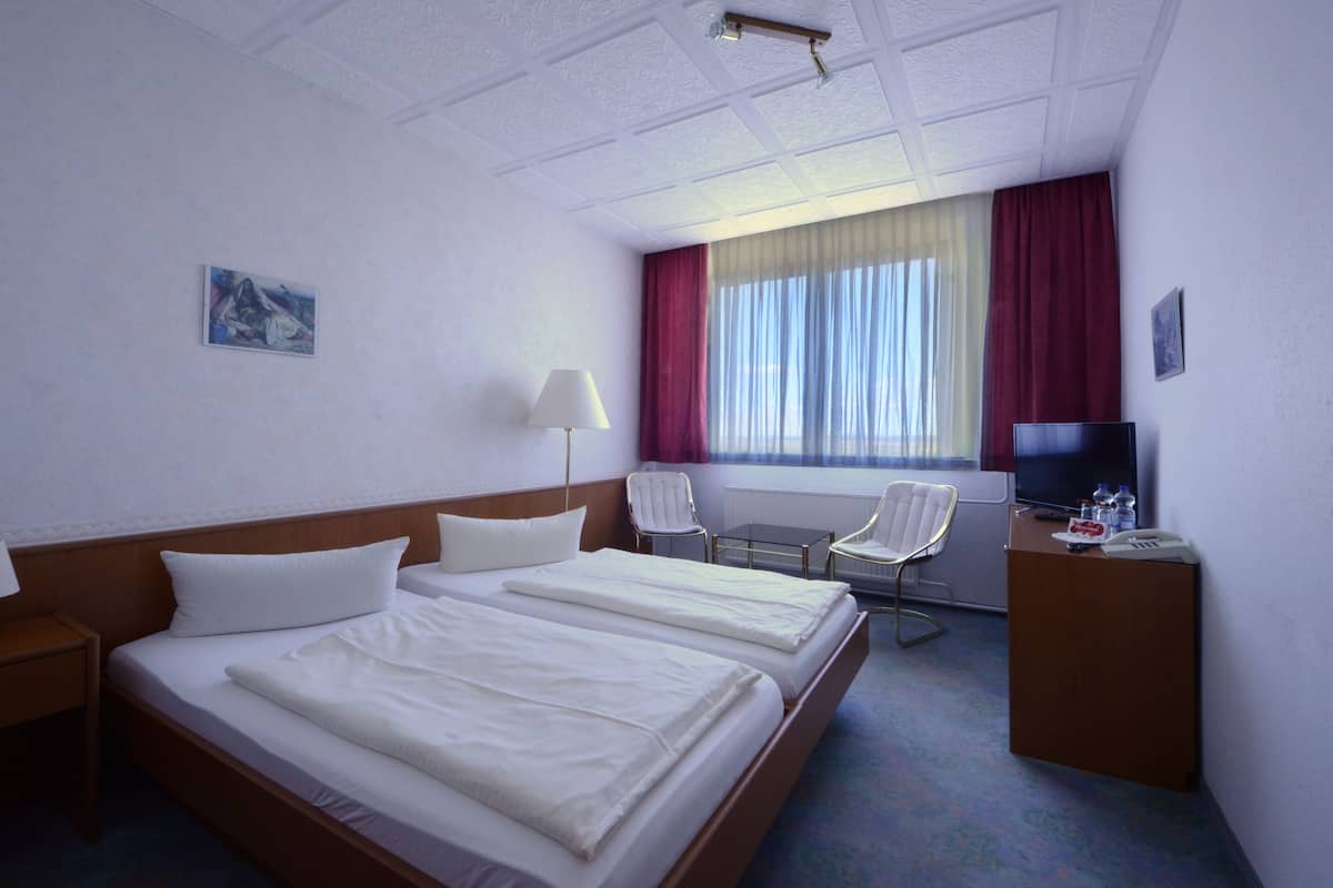 Desk, rollaway beds, free WiFi, bed sheets