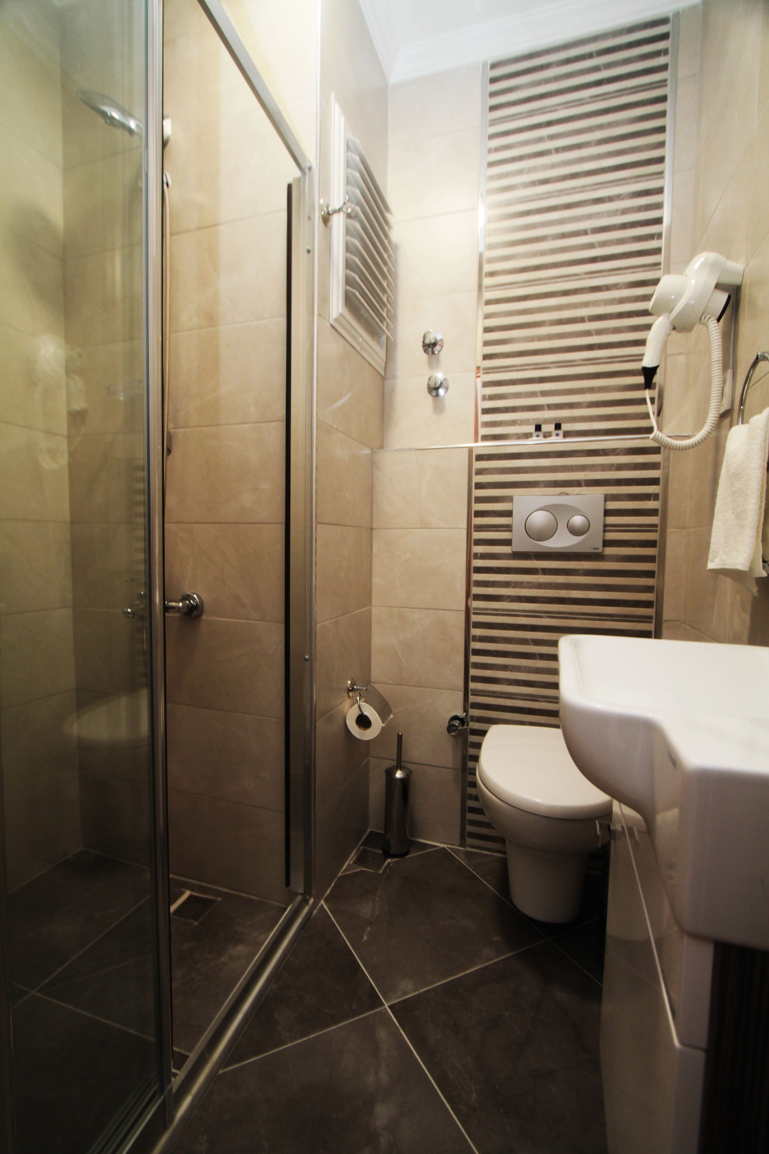 shower, free toiletries, hair dryer, slippers