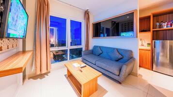 Family Room, 2 Bedrooms, Pool View (Free 2 Tickets To Aquaboom) | Living area | LED TV