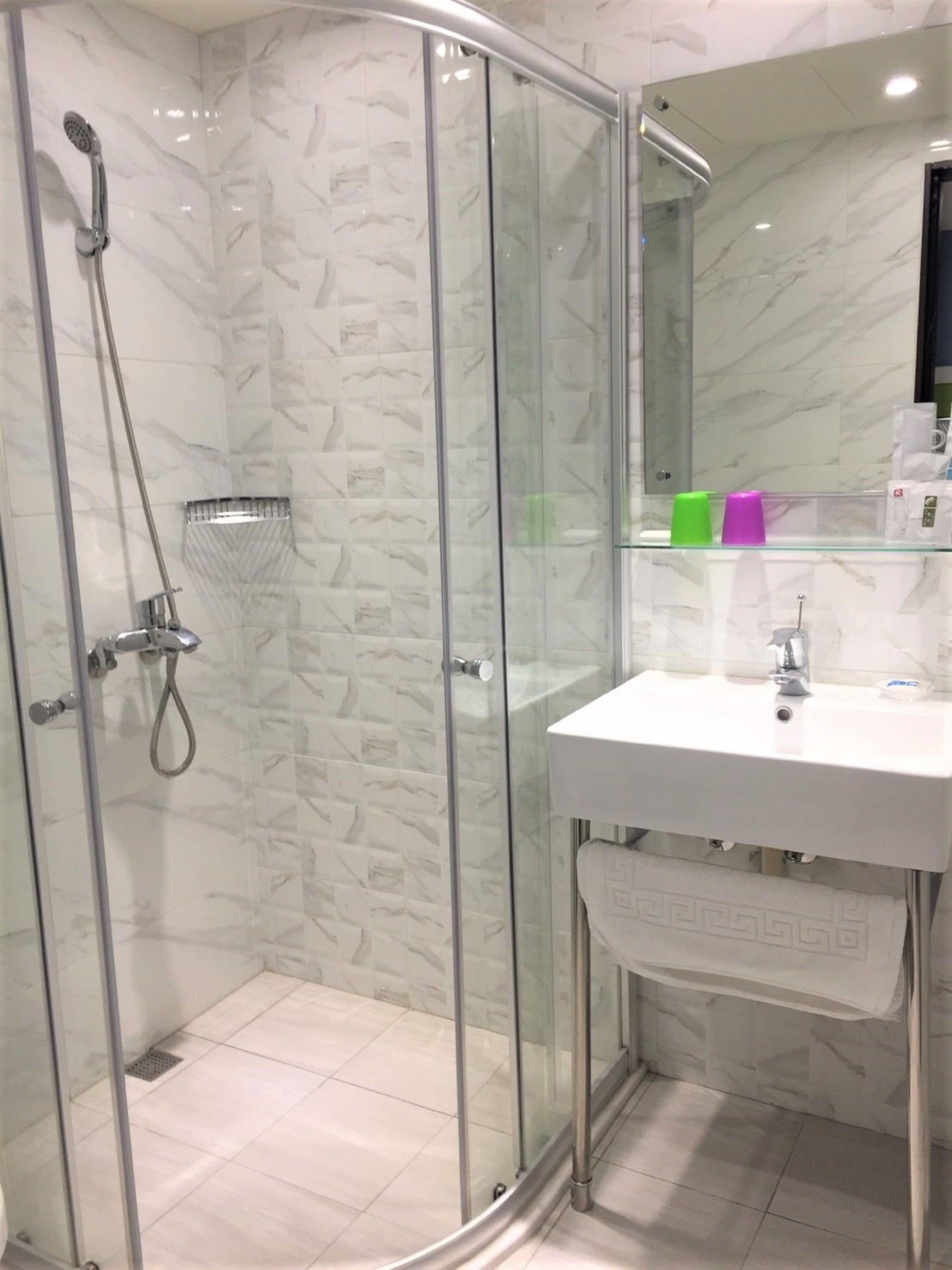 business twin room | bathroom | shower, free toiletries, hair dryer, slippers
