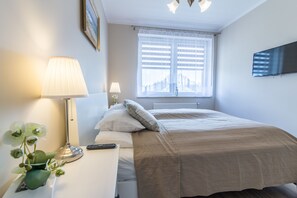 Apartemen Kota, 1 kamar tidur, balkon | 1 kamar tidur dan setrika/meja setrika