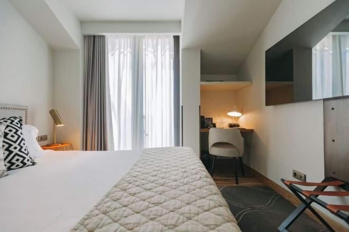 Egyptian cotton sheets, premium bedding, memory-foam beds, minibar
