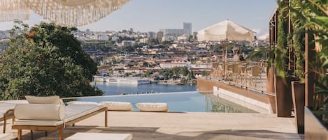 Indoor pool, outdoor pool, open 8:00 AM to 9:00 PM, pool umbrellas