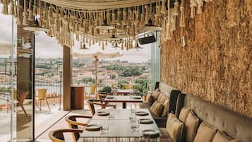 Breakfast, lunch, dinner served; pool views