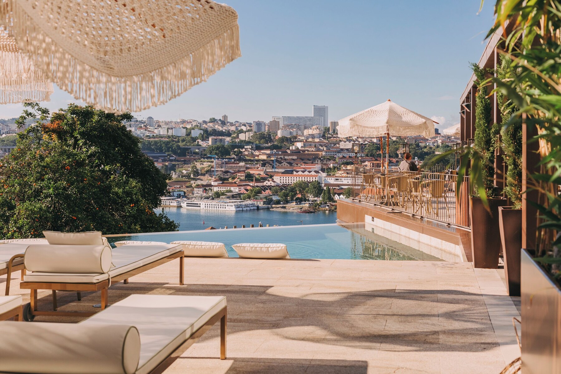 Indoor pool, outdoor pool, open 10:00 AM to 8:00 PM, pool umbrellas