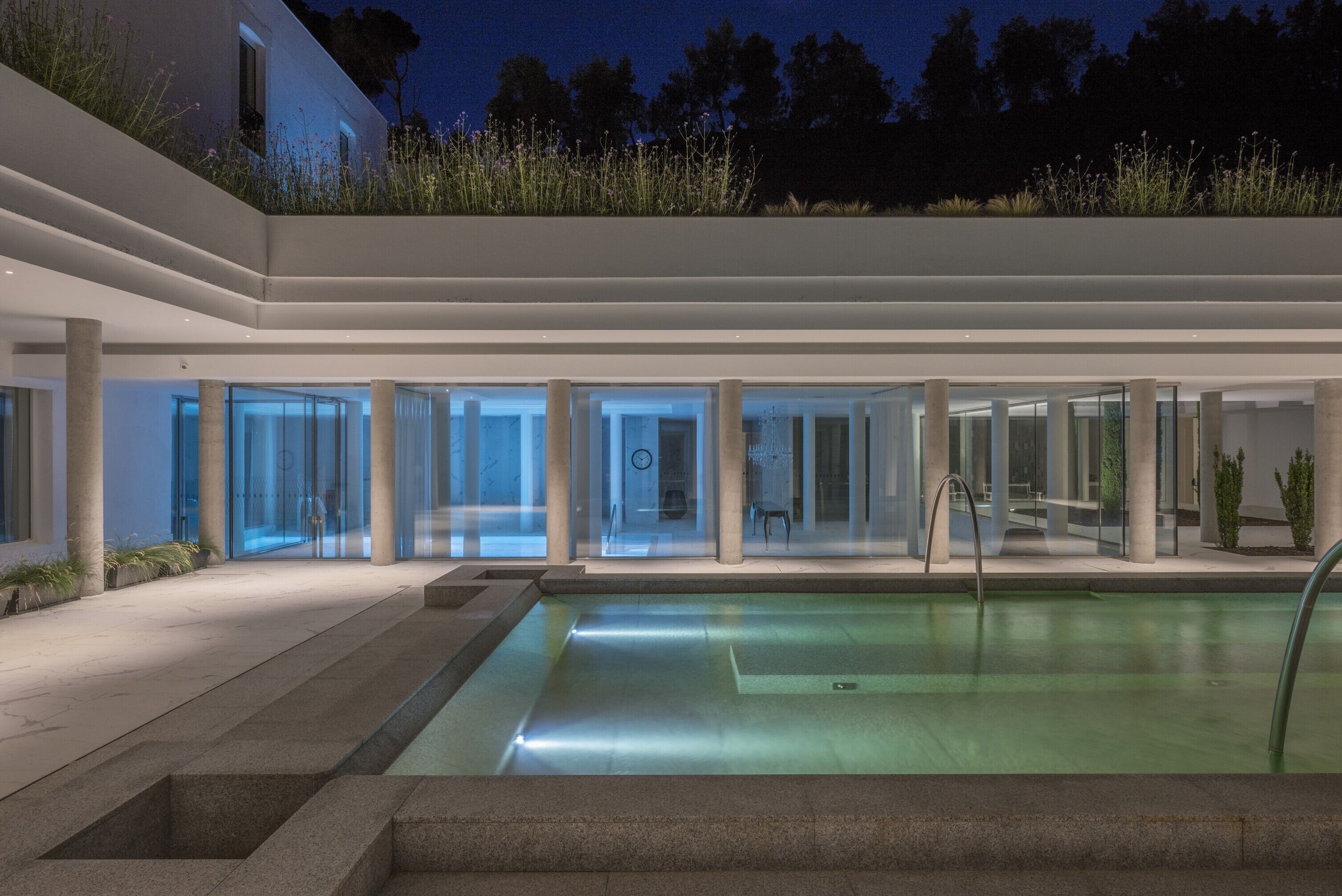 indoor pool, seasonal outdoor pool, pool umbrellas, pool loungers