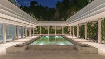 Indoor pool, seasonal outdoor pool, pool umbrellas, pool loungers