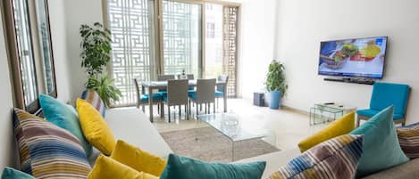 Appartamento, 2 camere da letto | Soggiorno | TV a schermo piatto, caminetto