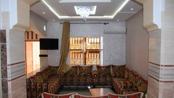 City Apartment, 2 Bedrooms, Pool View (G2) | Living room | Flat-screen TV