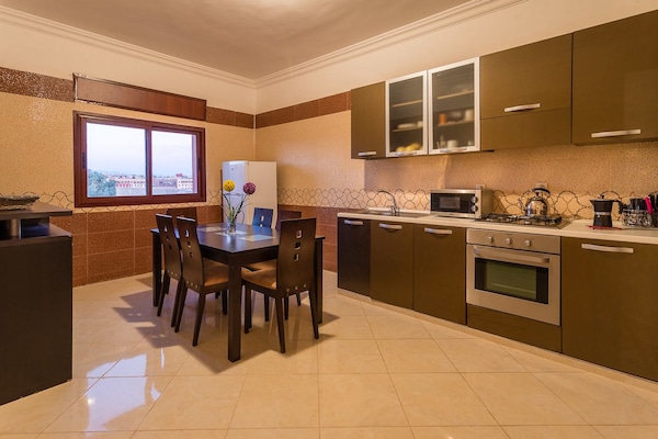 Comfort Apartment, 2 Bedrooms | Private kitchen | Full-size fridge, microwave, oven, stovetop