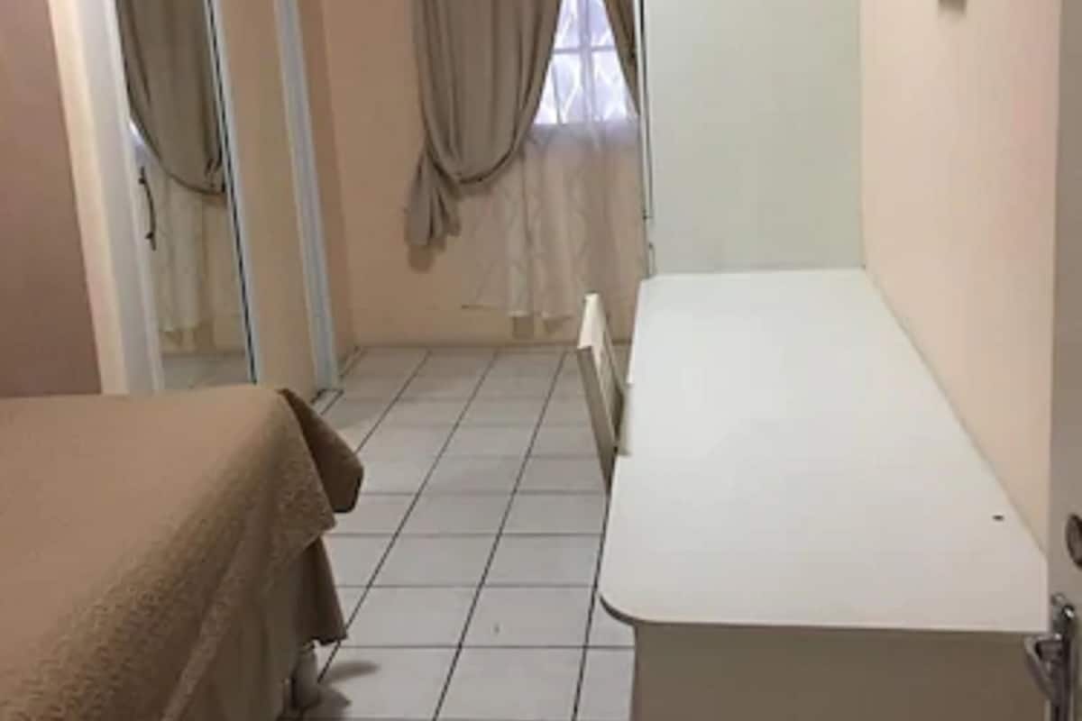 deluxe room, 2 double beds, kitchen | private kitchen | fridge, microwave