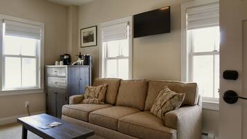 Standard Room, 1 Queen Bed with Twin Sofa bed | Living area | Flat-screen TV