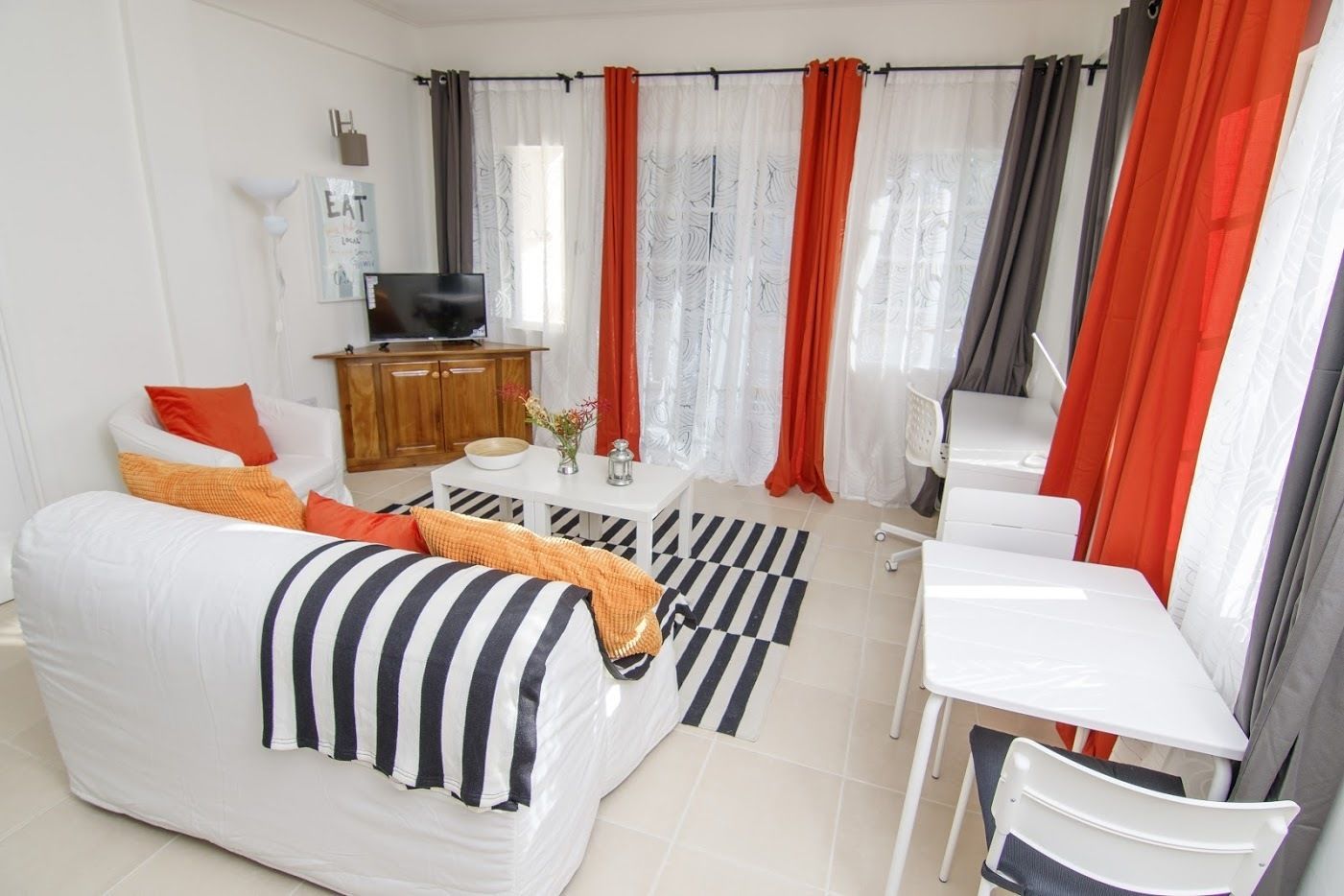 Apartment, 1 Queen Bed with Sofa bed, Kitchenette | Living room | 32-inch flat-screen TV with cable channels, TV