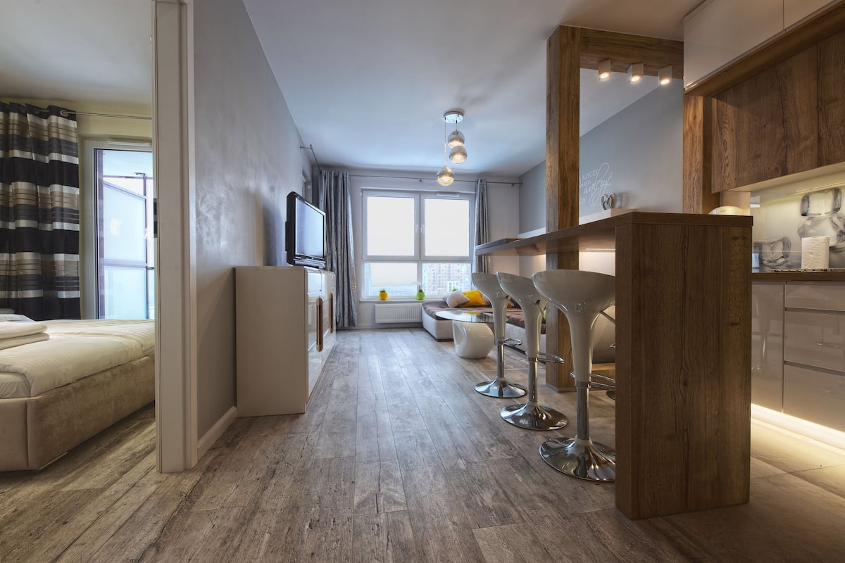Apartamento, vistas al mar | Zona de estar | Una televisión de pantalla plana