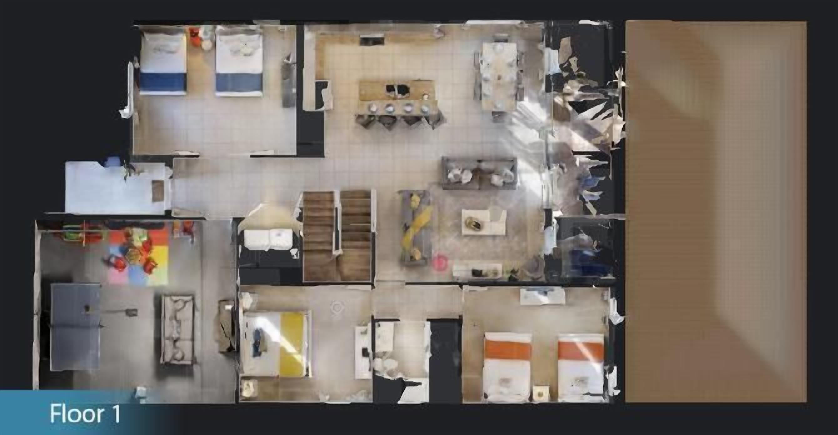 A floor plan of a hotel with multiple rooms, a dining area, and a kitchen.