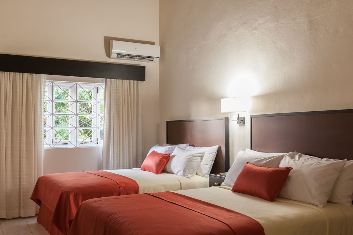 premium room, 2 queen beds, refrigerator | blackout curtains, free wifi, bed sheets, wheelchair access