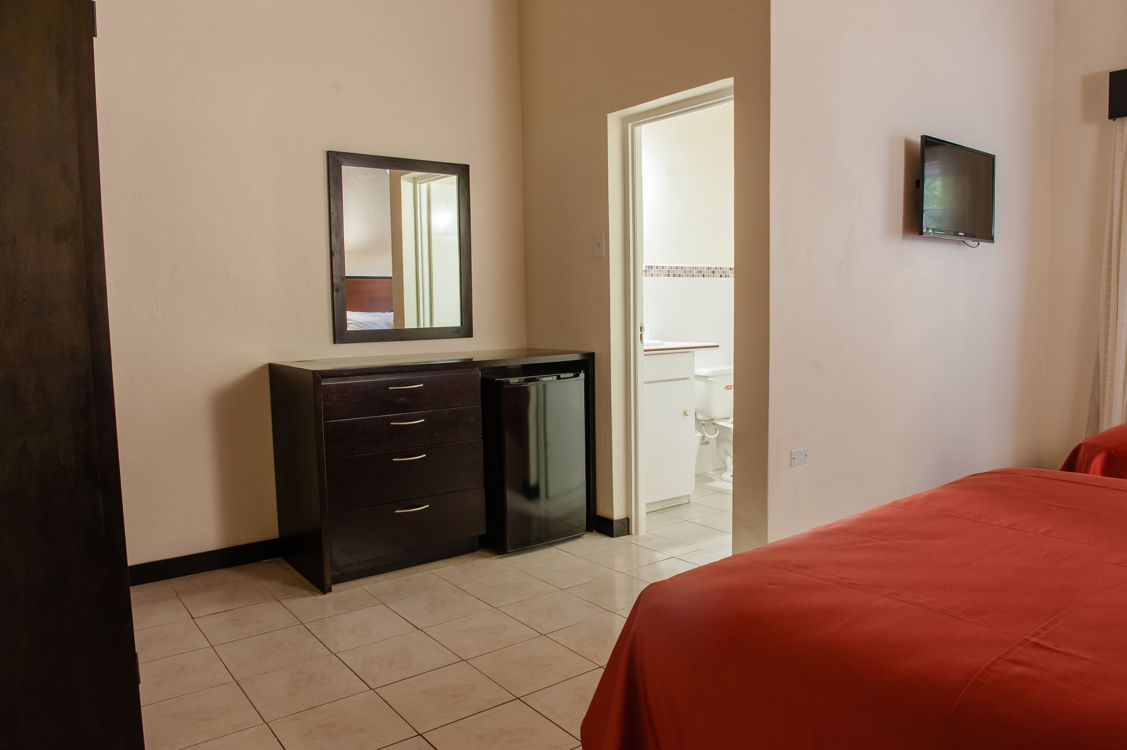 premium room, 2 queen beds, refrigerator | room amenity