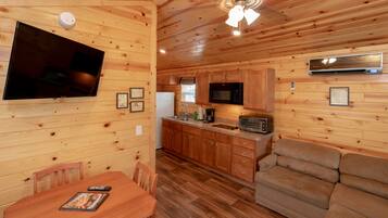 Deluxe Park Model Cottage (No Linens Included) | Private kitchen | Fridge, microwave, stovetop, coffee/tea maker