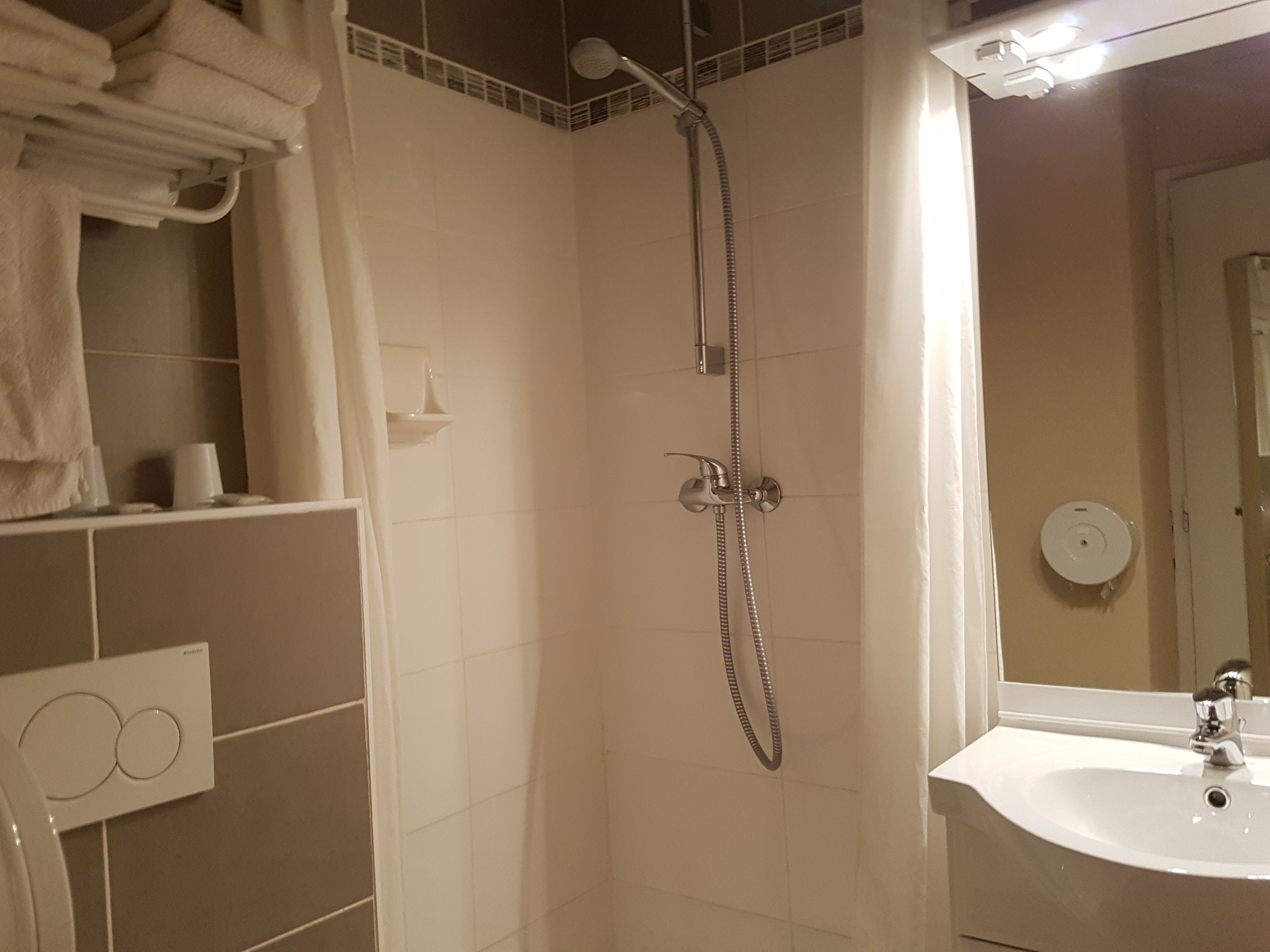 shower, free toiletries, hair dryer, towels