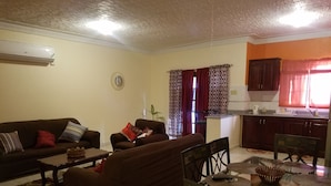 32-inch flat-screen TV with satellite channels, TV