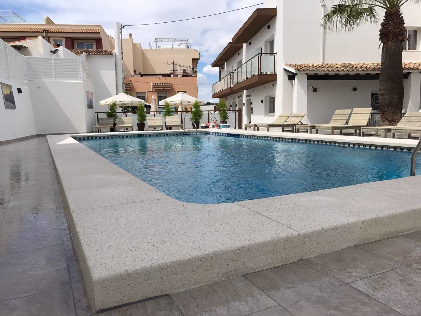 outdoor pool, pool loungers