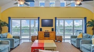 House, 5 Bedrooms | Living area | Flat-screen TV, books, stereo