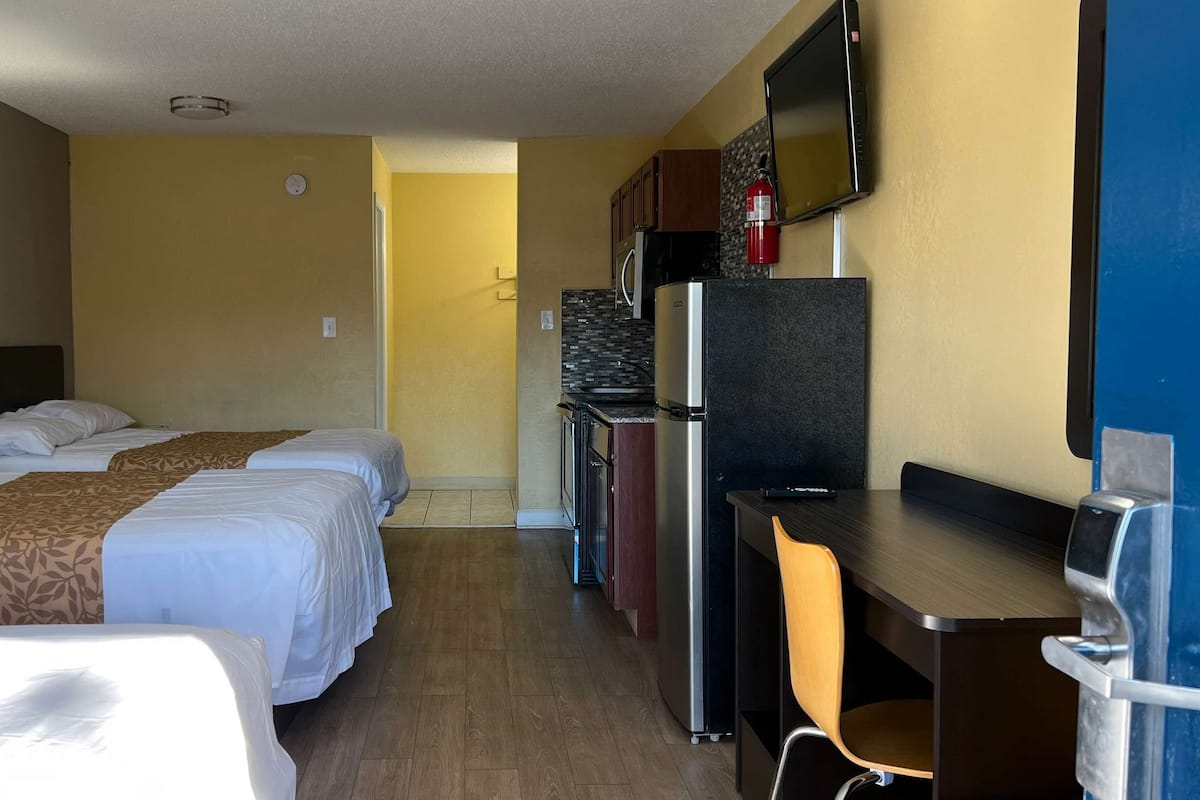 Standard Room, Multiple Beds, Non Smoking, Kitchenette | Blackout drapes, iron/ironing board, free WiFi, bed sheets