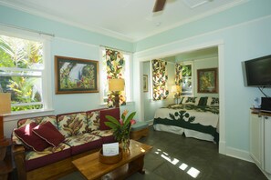 Romantic Cottage Hot Tub, Private Kitchen, No Breakfast Provided | Living area | 32-inch flat-screen TV with cable channels, TV, DVD player - Iao Valley Inn (Wailuku)