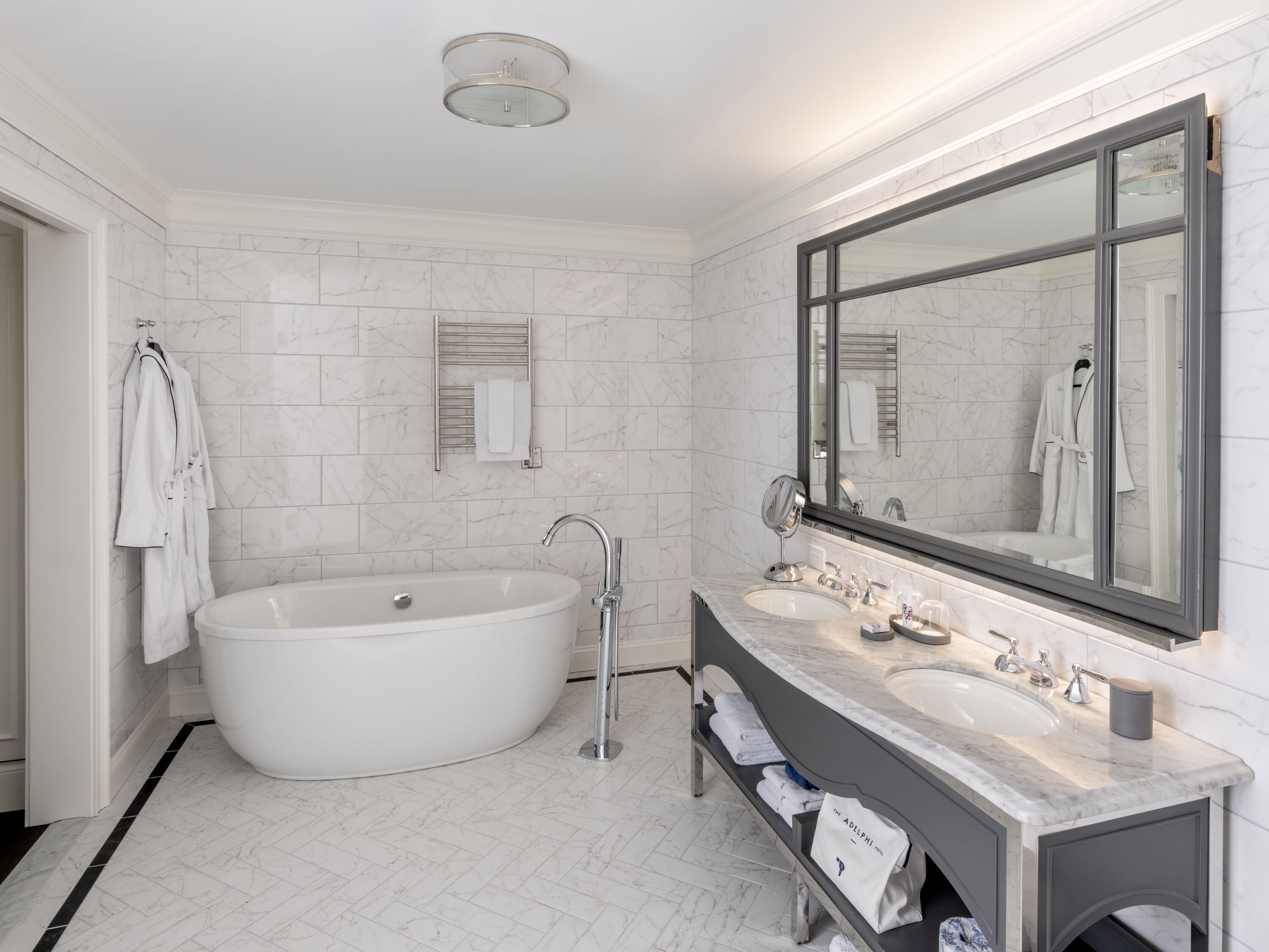 superior suite, 1 king bed with sofa bed | bathroom | designer toiletries, hair dryer, bathrobes, slippers