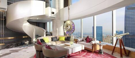 A modern living room with a spiral staircase, a large window with a city view, and a telescope on a tripod.