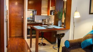 Superior Triple Room | Living area - Plaza Town Santiago (Santiago)