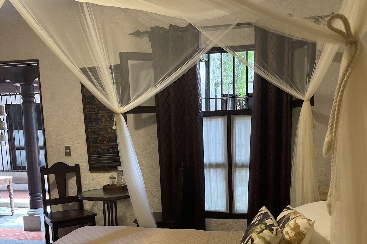 Deluxe Room | Down comforters, desk, iron/ironing board, free WiFi