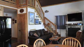 Smart TV, fireplace, DVD player, books