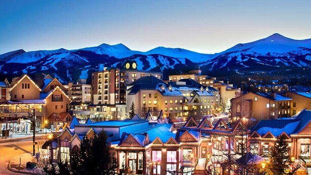A town with buildings and a mountain in the background. - Breckenridge Ski In Ski Out Condo, Great Views, Pool & Hot Tubs, Walk to Town (Breckenridge)