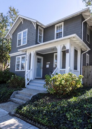 A two-story house with a front porch, a mailbox, and a number plaque. - Magnificent, original Va Beach home located a 3 minute walk from the ocean! (Virginia Beach)